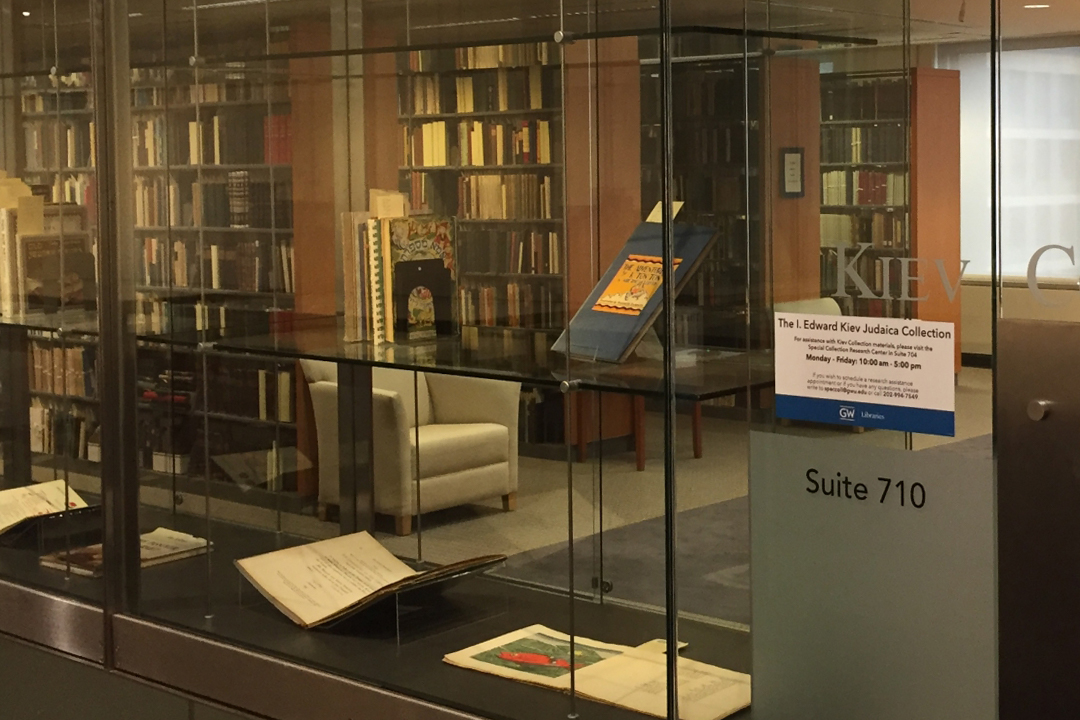 glass door leading into the Kiev Collection, with several bookshelves in the background