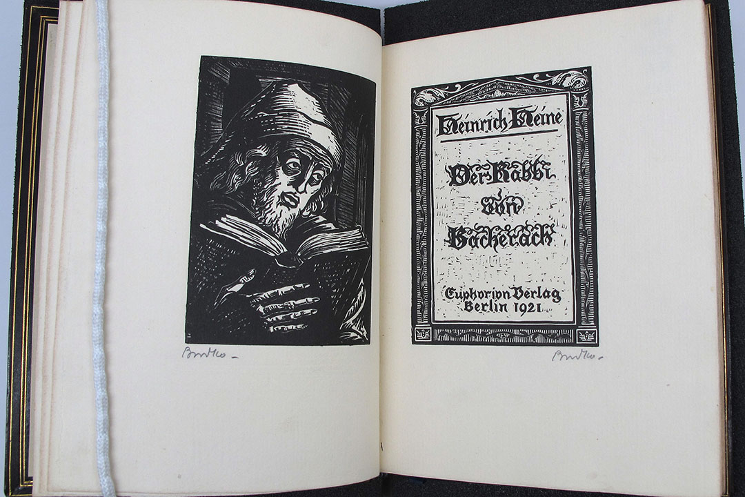 Open pages of the book "The Rabbi of Bacharach" by Heinrich Heine
